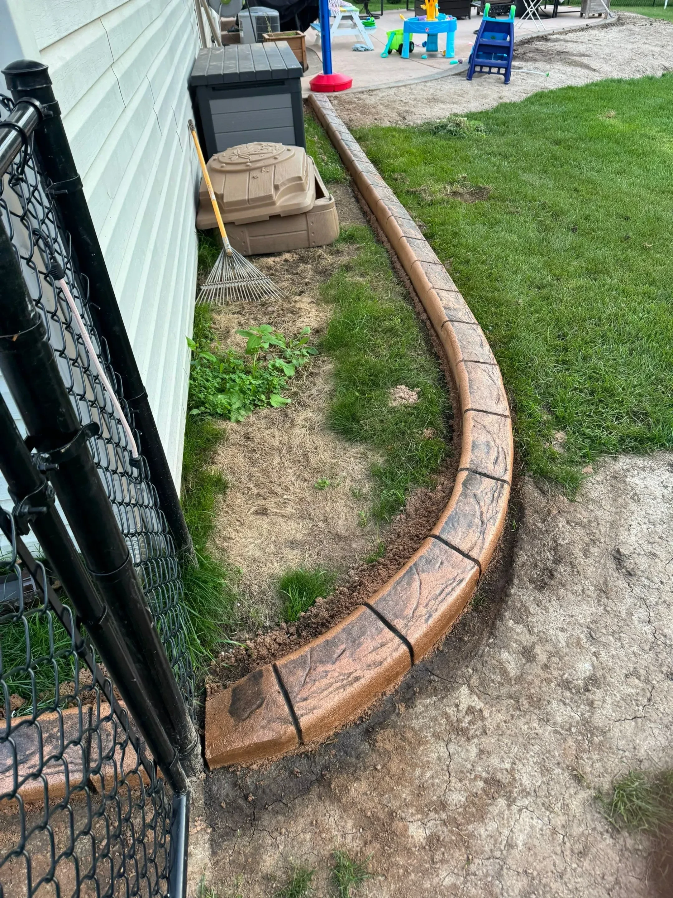 Traxler Curbing equipment for landscape curbing in Shakopee, MN